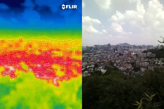 28일 열화상카메라로 바라본 서울 도심의 모습. 온도가 높을수록 사진 속 붉은색으로 나타나며 상대적으로 온도가 낮은 곳은 푸른 색으로 나타난다. 2023.7.28/뉴스1