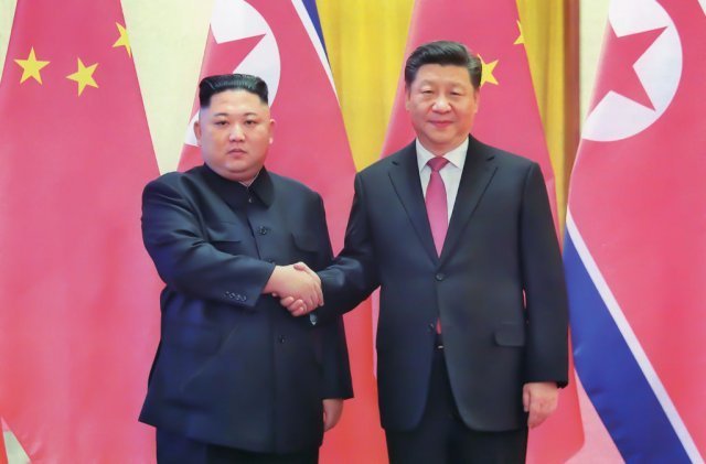왼쪽부터 김정은 북한 국무위원장, 시진핑 중국 국가주석. Gettyimages