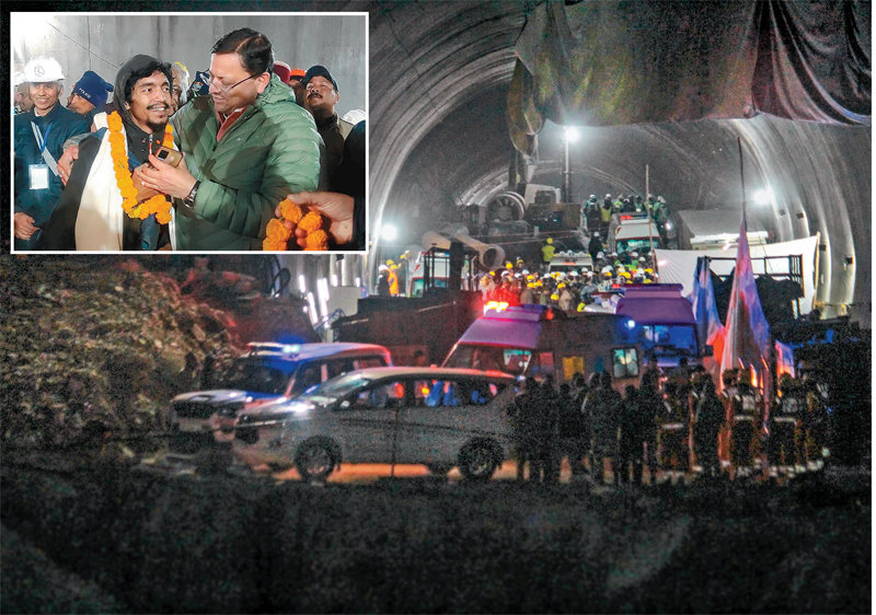 붕괴 터널속에서 17일간 버틴 印 노동자들 28일 인도 북부 우타라칸드주 실키아라 인근 터널 공사장 붕괴 현장에서 
노동자들을 구조하기 위한 구급차들이 터널 입구에 대기해 있다. 17일간 이 터널에 갇혀 있던 노동자 41명은 모두 구조됐고 건강 
상태 또한 양호한 것으로 알려졌다(큰 사진). 푸슈카르 싱 다미 우타라칸드주 총리(작은 사진 오른쪽)가 구조된 노동자의 손을 
잡으며 무사 귀환을 반기고 있다. 실키아라=AP 뉴시스