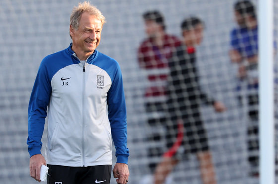 Coach Jürgen Klinsmann of the Korean national soccer team is smiling at the Al Egla Training Center in Doha, Qatar, on the 28th (local time) ahead of the round of 16 match against Saudi Arabia in the 2023 Asian Football Confederation (AFC) Qatar Asian Cup. 2024.1.28. News 1