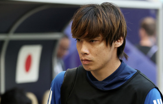 Japan's Junya Ito, who was accused of sexual misconduct, heads to the bench during the 2023 Asian Football Confederation (AFC) Qatar Asian Cup round of 16 match between Bahrain and Japan held at Al Thumama Stadium in Doha, Qatar on the 31st (local time).  2024.1.31/News 1