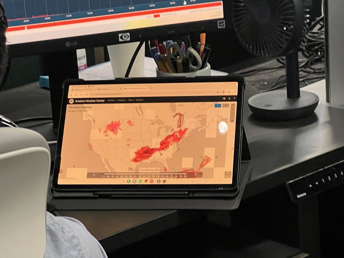 A device on the flight manager's desk that displays weather information