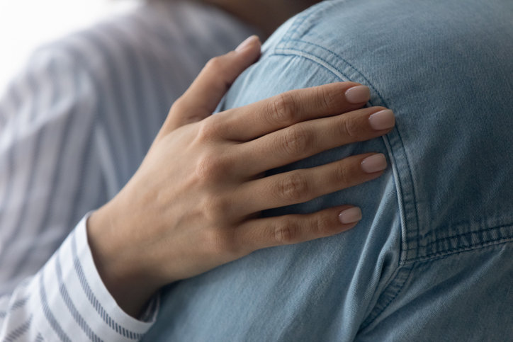 When your spouse or lover is trembling due to nervousness, going up to them and hugging them or holding their hands can have a calming effect.  Getty Images