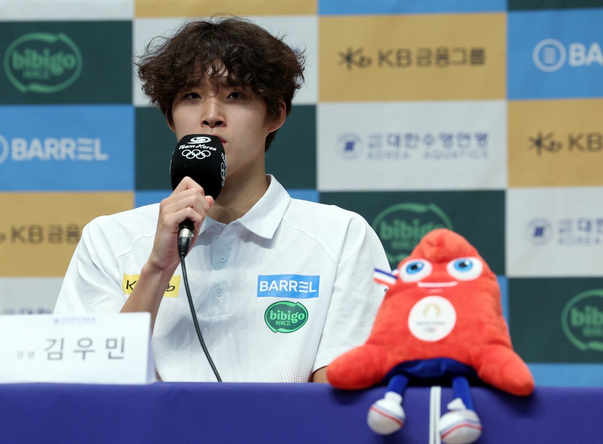 Kim Woo-min, a member of the national swimming team, is being interviewed at the 2024 Paris Summer Olympics national swimming team media day held at the Jincheon National Athletes' Village Swimming Center in Jincheon-gun, Chungcheongbuk-do on the afternoon of the 18th.  2024.6.18 News 1