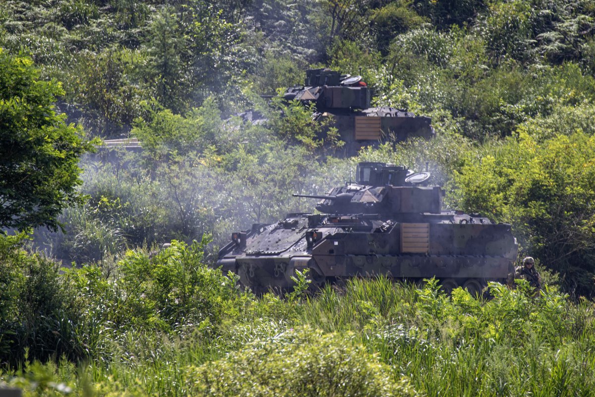 A US Bradley armored vehicle participating in the 'ROK-US joint small unit live-fire maneuver training' is firing at a target. Photo courtesy of the Army