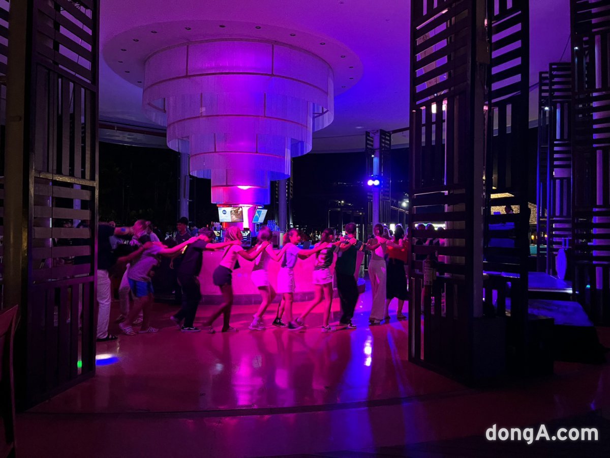 Visitors from all over the world come together to dance at Club Med Bali.