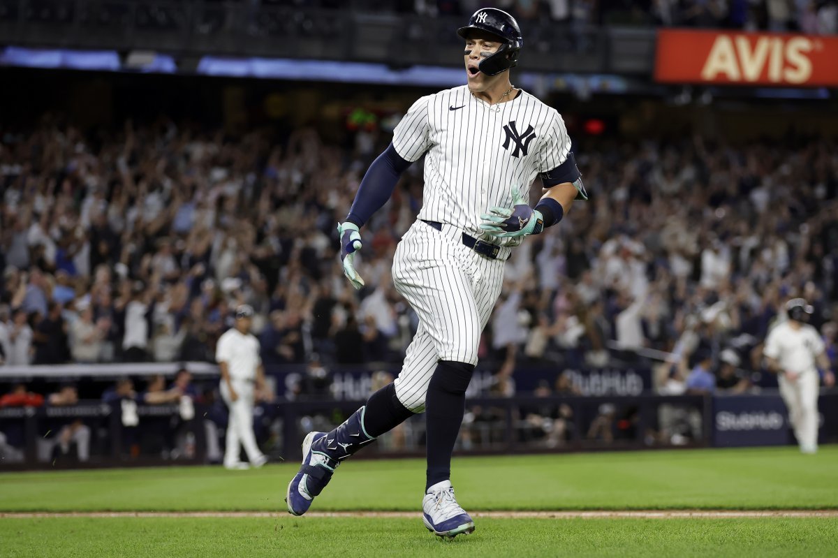 New York Yankees‘ Aaron Judge reacts after hitting a grand slam during the seventh inning of a baseball game at bat Friday, Sept. 13, 2024, in New York. (AP Photo/Adam Hunger)