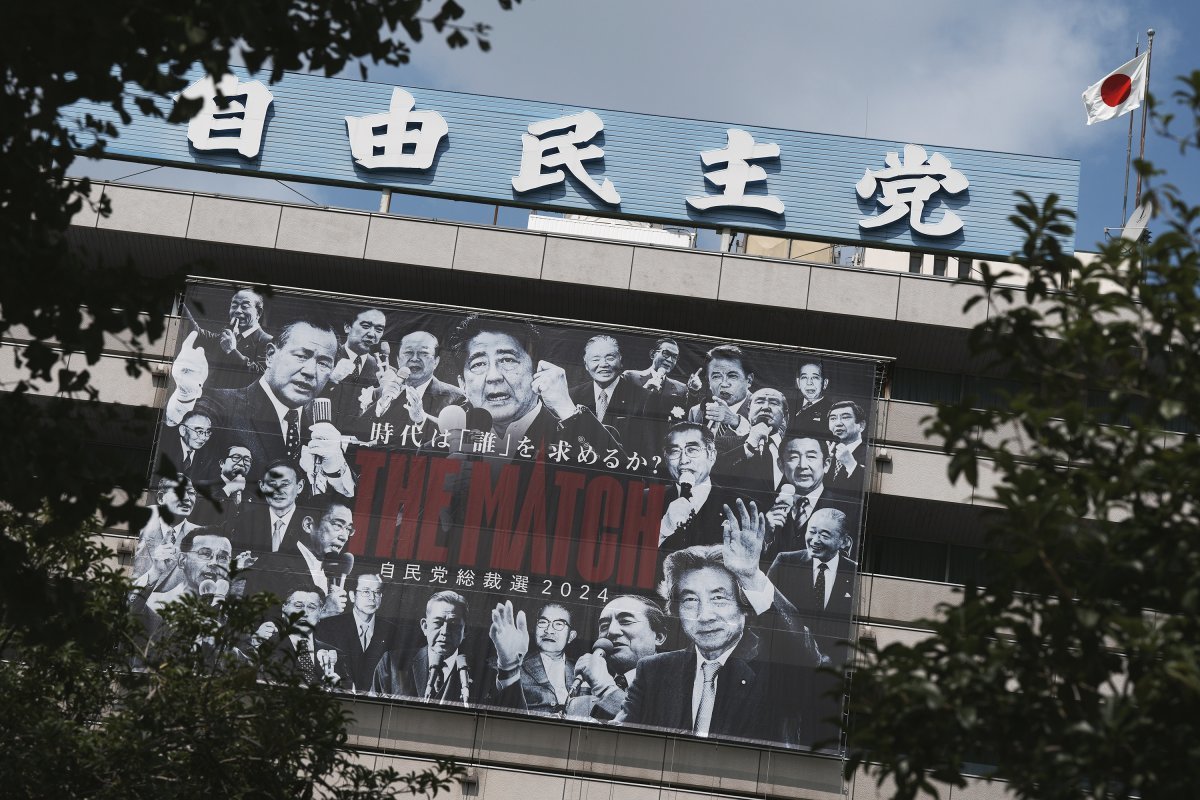 A banner displaying the photos of successive leaders of the Liberal Democratic Party (LDP) is seen at the headquarter building of LDP Thursday, Sept. 12, 2024, in Tokyo. (AP Photo/Eugene Hoshiko)