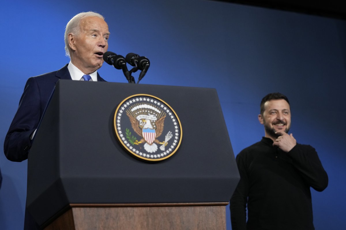 President Joe Biden, joined by President of Ukraine Volodymyr Zelenskyy, speaks during an event on the Ukraine Compact on the sidelines of the NATO Summit in Washington, Thursday, July 11, 2024. Biden launched the Ukraine Compact, signed by 25 countries and the European Union, as part of a commitment to Ukraine‘s long term security. (AP Photo/Susan Walsh)