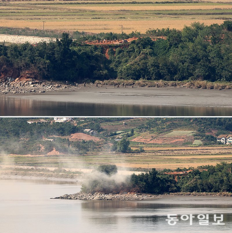 북한군, 접경 지역서 발파 추정 작업 9일 경기 파주 오두산통일전망대에서 촬영한 접경 지역 북한군들의 모습(위 사진). 폭발음이 나더니 하얀 연기가 치솟고(아래 사진), 얼마 지나지 않아 북한군 수십 명이 언덕으로 몰려나와 작업을 하고 있다. 북한군 총참모부가 이날부터 남북을 차단하는 ‘요새화’ 공사를 진행한다고 발표한 만큼 이 폭파는 바위 등을 발파하기 위한 것으로 추정된다. 요새화 과정에서 전술도로나 초소 등 각종 시설을 만드는 데 필요한 돌을 비무장지대(DMZ) 북측 지역에 공수하기 위한 작업이란 관측이 나왔다. 파주=장승윤 기자 tomato99@donga.com