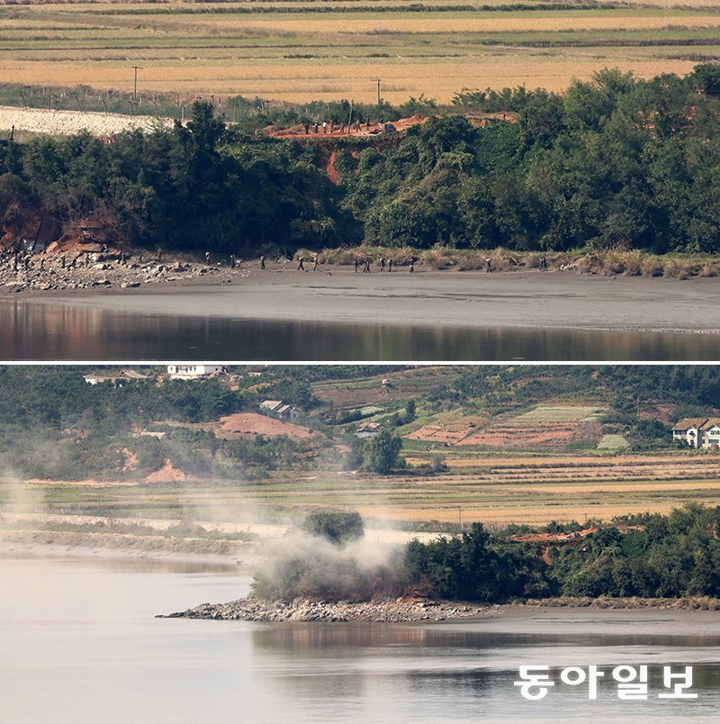 북한군, 접경 지역서 발파 추정 작업 9일 경기 파주 오두산통일전망대에서 촬영한 접경 지역 북한군들의 모습(위 사진). 폭발음이 나더니 하얀 연기가 치솟고(아래 사진), 얼마 지나지 않아 북한군 수십 명이 언덕으로 몰려나와 작업을 하고 있다. 북한군 총참모부가 이날부터 남북을 차단하는 ‘요새화’ 공사를 진행한다고 발표한 만큼 이 폭파는 바위 등을 발파하기 위한 것으로 추정된다. 요새화 과정에서 전술도로나 초소 등 각종 시설을 만드는 데 필요한 돌을 비무장지대(DMZ) 북측 지역에 공수하기 위한 작업이란 관측이 나왔다. 파주=장승윤 기자 tomato99@donga.com