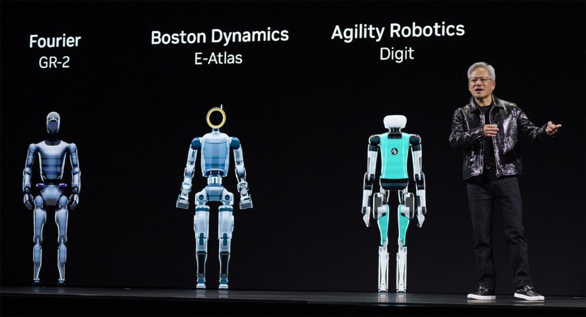 젠슨 황 엔비디아 최고경영자가 6일(현지 시간) 미국 라스베이거스에서 가죽 재킷을 입고 ‘CES 2025’ 기조연설을 하고 있다. 황 CEO는 로봇용 인공지능(AI) 개발 플랫폼인 ‘코스모스’를 출시하면서 “로봇의 챗GPT 변곡점이 오고 있다”고 말했다. 황 CEO 옆에는 중국 푸리에의 GR-2(왼쪽), 현대자동차 계열사인 미국 보스턴다이내믹스의 아틀라스(왼쪽에서 두 번째), 미국 어질리티로보틱스의 디짓 등 인간형 로봇의 모습이 보인다. 코스모스는 이런 로봇들이 방대한 데이터를 학습할 수 있도록 지원하는 플랫폼이다. 게티이미지
