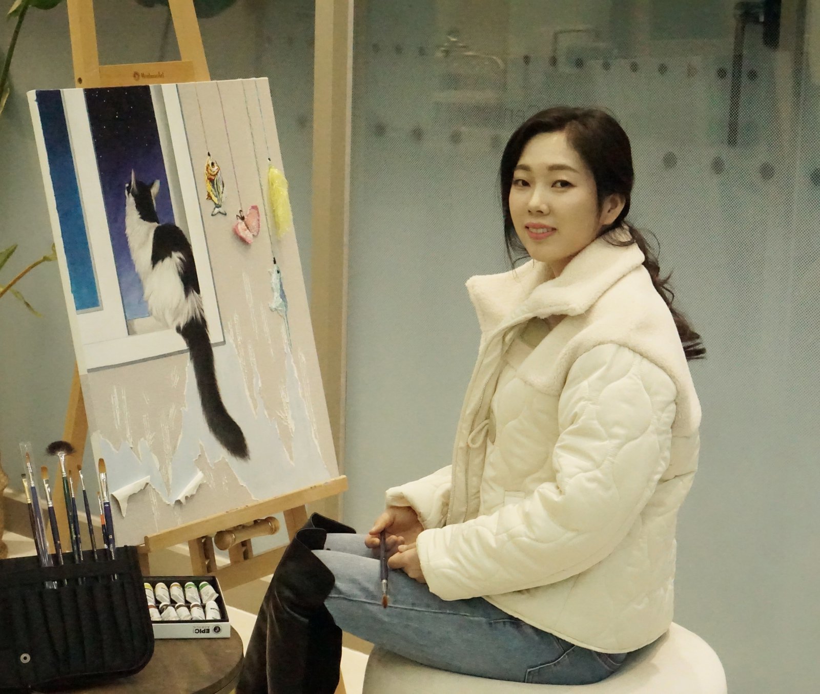 수많은 고난과 역경을 극복하고 한국에서 화가로 성장해 가는 이지혜 씨.