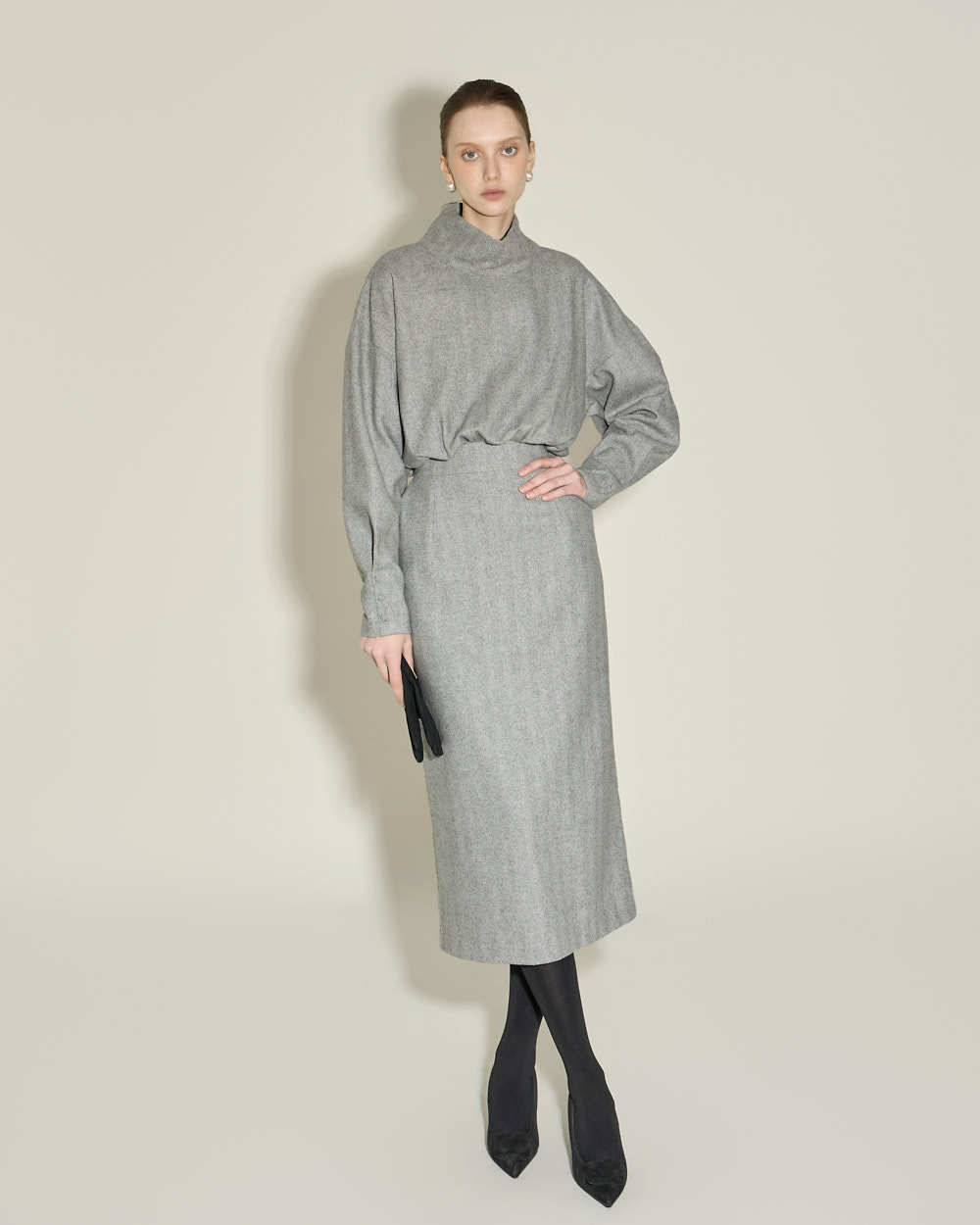 이부진 이사장이 착용한 브랜드 딘트의 하이넥 울 원피스. 뉴스1