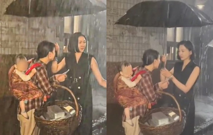 문제의 촬영 장면. 검은색 의상을 입은 배우 싱윈은 감독이 우산으로 아기를 가리는 것을 막고 장시간 폭우에 노출되게 했다고 밝혔다. 웨이보 갈무리