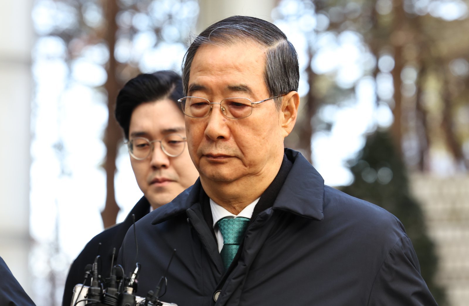 12·3 비상계엄 관련 내란 방조 등 혐의를 받는 한덕수 전 국무총리가 21일 서울 서초구 서울중앙지법에서 열린 1심 선고공판에 출석하고 있다. 2026.01.21. [서울=뉴시스]