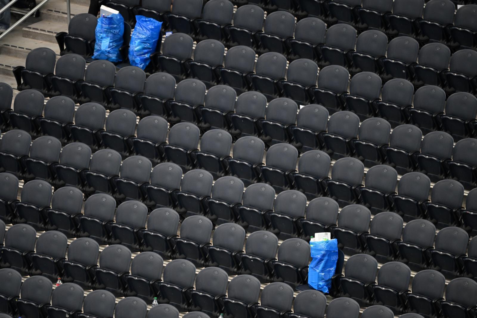 Bags of trash collected by Japan fans sits in the empty stands following the World Cup Group F soccer match between the Netherlands and Japan in Arlington, Texas, near Dallas, Sunday, June 14, 2026. (AP Photo/Jessica Tobias)