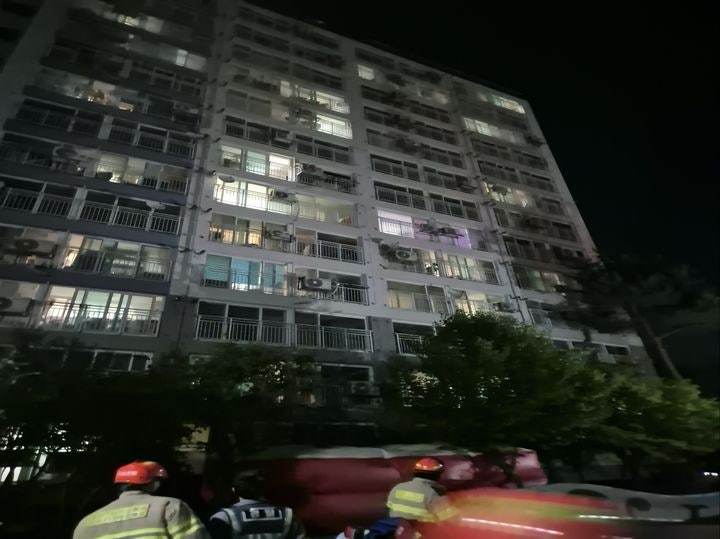 Woman Rescued After Dangling From 7th-Floor Air Conditioner Unit