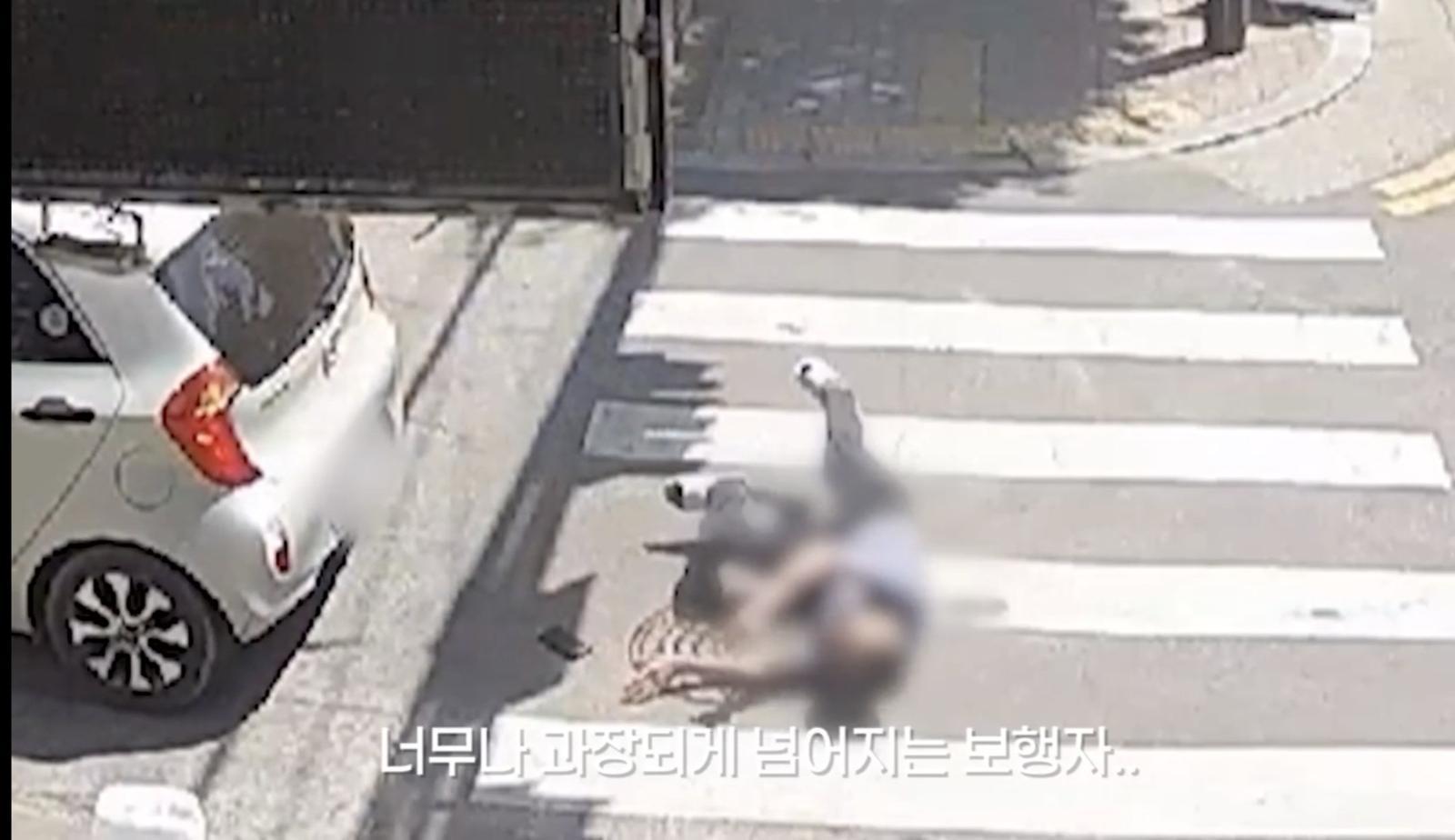 차량에 몸 밀착한 뒤 과장된 몸짓으로 쓰러진 보험사기범…덜미