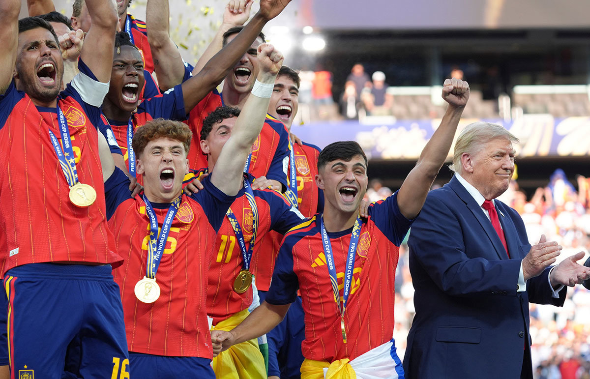 Trump lingers on stage during Spain's World Cup victory ceremony
