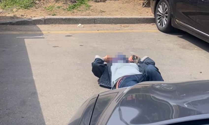 People blocking parking spots with their bodies: Is legal punishment possible?