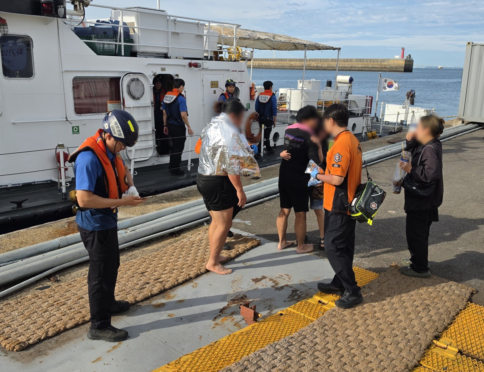 Three rescued after drifting 11 hours when boat capsized off Incheon coast