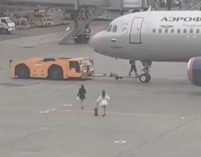 Women who missed flight run onto runway in attempt to stop plane in Russia