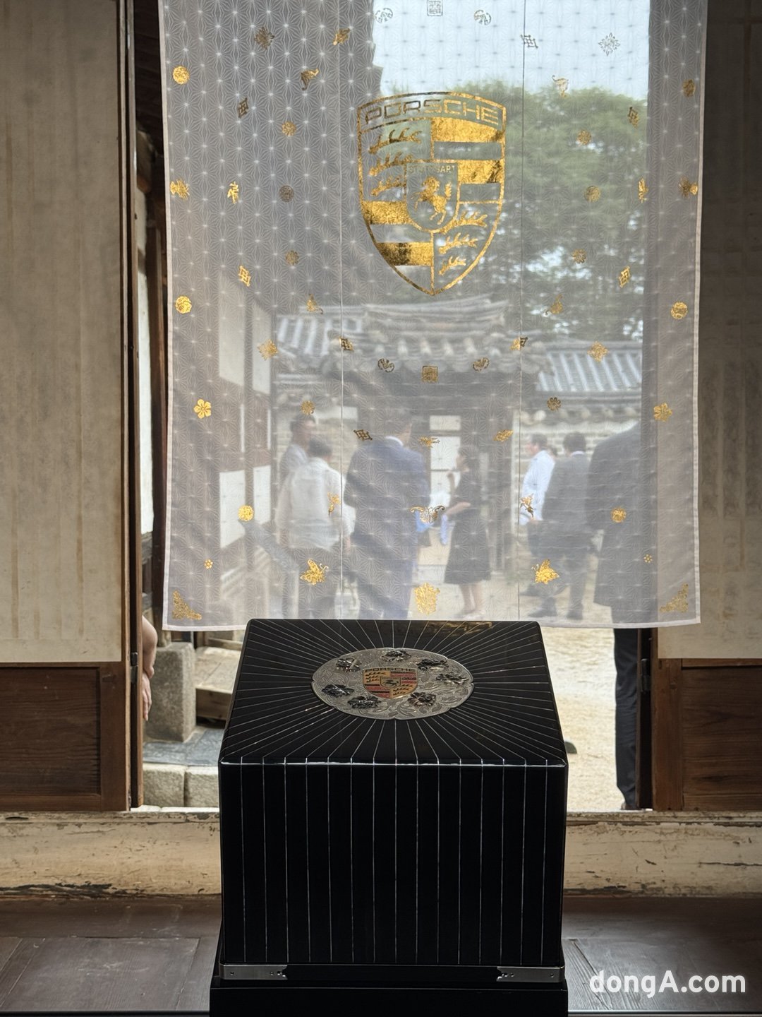 A golden Porsche crest appears at Changdeokgung as heritage reaches for the world
