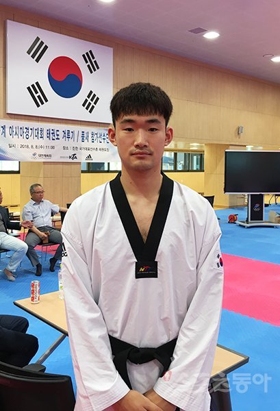 2018자카르타-팔렘방아시안게임 태권도대표팀 이화준이 8일 진천선수촌 개선관에서 열린 미디어데이 행사에서 포즈를 취하고 있다. 진천|강산 기자 posterboy@donga.com
