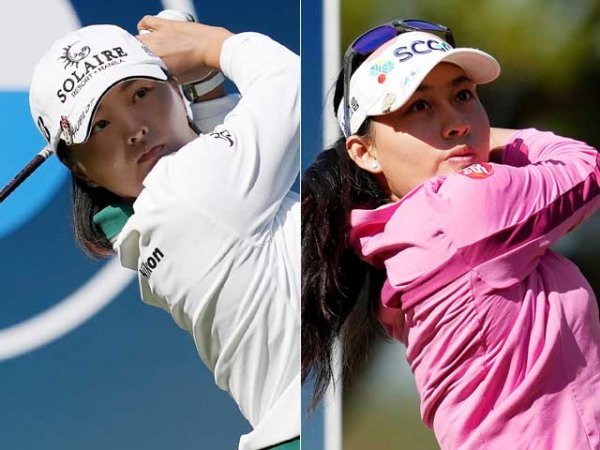 20일 강원 원주시 오크밸리CC에서 열린 LPGA투어 BMW 레이디스 챔피언십 1라운드에서 세계랭킹 1위 고진영이 최하위권으로 떨어진 반면, 그의 자리를 위협하는 ‘슈퍼 루키’ 아타야 티띠꾼은 리더보드 최상단을 점령했다. 3번홀에서 티샷을 하고 있는 고진영(왼쪽)과 티띠꾼. 사진제공 l BMW코리아