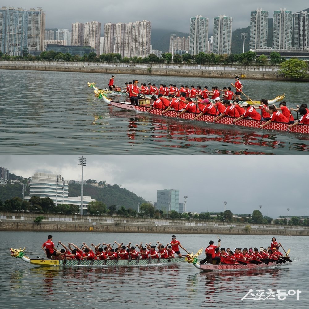 홍콩 국제 용선 경주를 앞두고 훈련을 하고 있는 선수들. 홍콩 외각의 고급 주택가인 샤틴 싱문강의 조정시설에서 연습을 한다. 선수들 너머로 보이는 스탠드는 홍콩의 양대 경마장 중 하나인 샤틴 경마장. 홍콩 | 스포츠동아 김재범 기자 oldfield@donga.com