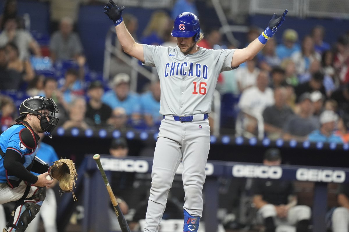 Chicago Cubs‘ Patrick Wisdom (16) reacts after bring called out on strikes during the fourth inning of a baseball game against the Miami Marlins, Sunday, Aug. 25, 2024, in Miami. (AP Photo/Lynne Sladky)