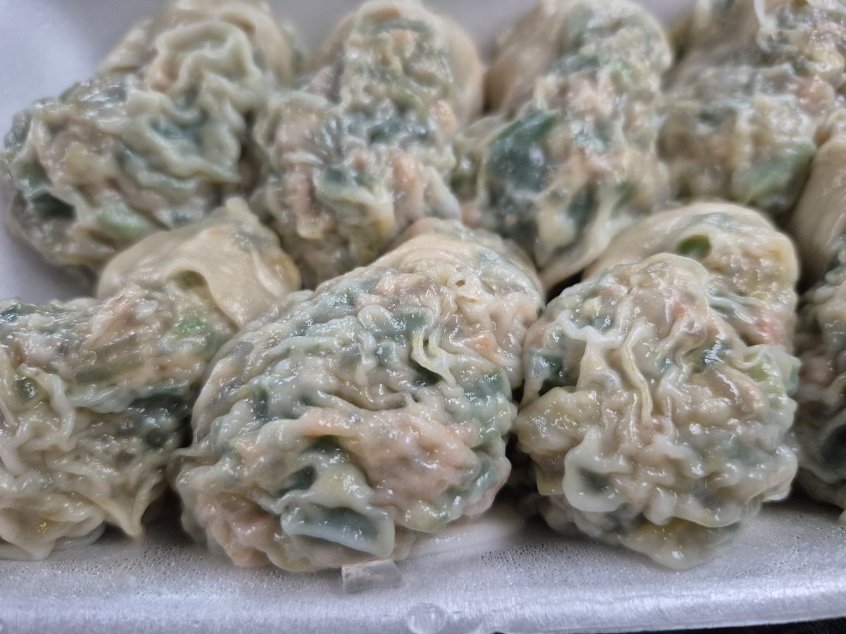 유재용 명인이 빚은 고기만두. 사람의 뇌를 축소해놓은 듯 쪼글쪼글한 피가 인상적이다.