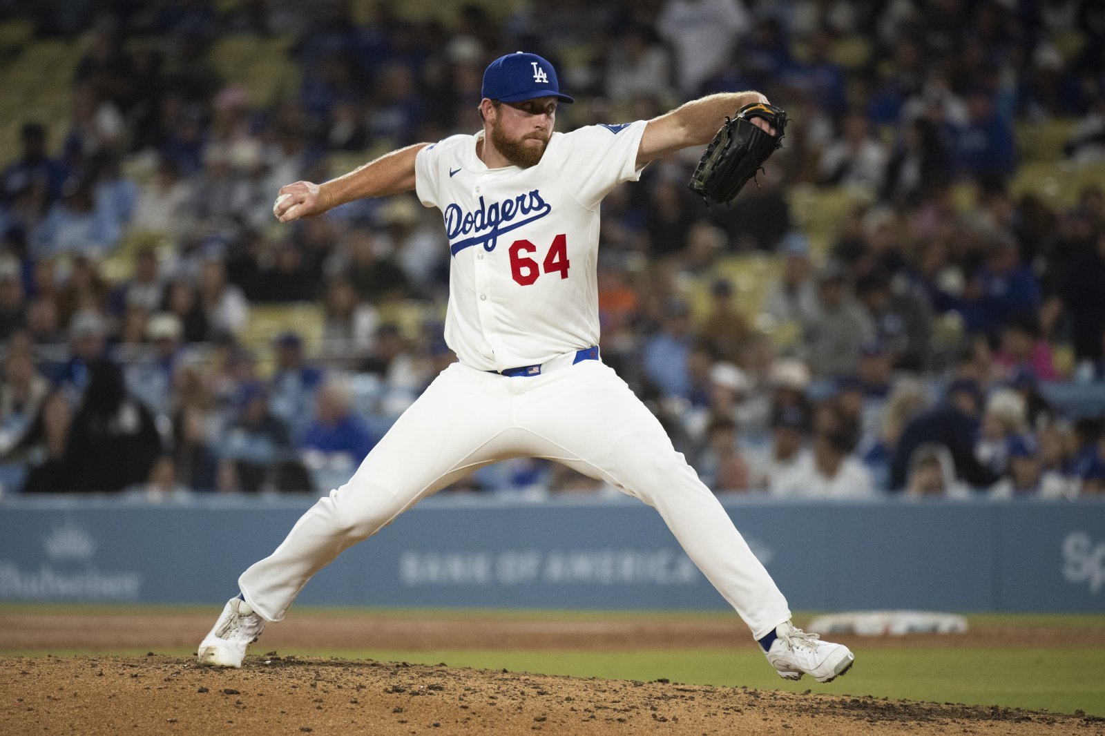 Los Angeles Dodgers relief pitcher Matt Sauer delivers a pitch during the third inning of a baseball game against the Miami Marlins in Los Angeles, Tuesday, April 29, 2025. (AP Photo/Kyusung Gong)