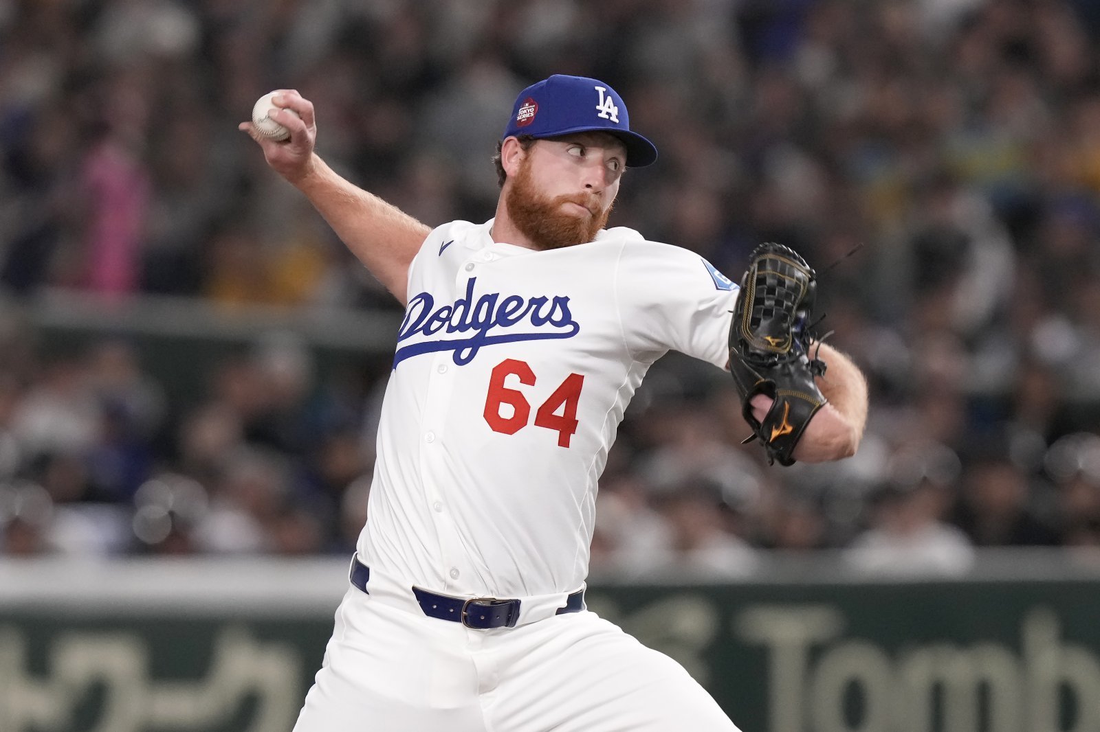 Los Angeles Dodgers pitcher Matt Sauer works against the Hanshin Tigers during the fifth inning in an MLB Japan Series exhibition baseball game, Sunday, March 16, 2025, in Tokyo. (AP Photo/Eugene Hoshiko)