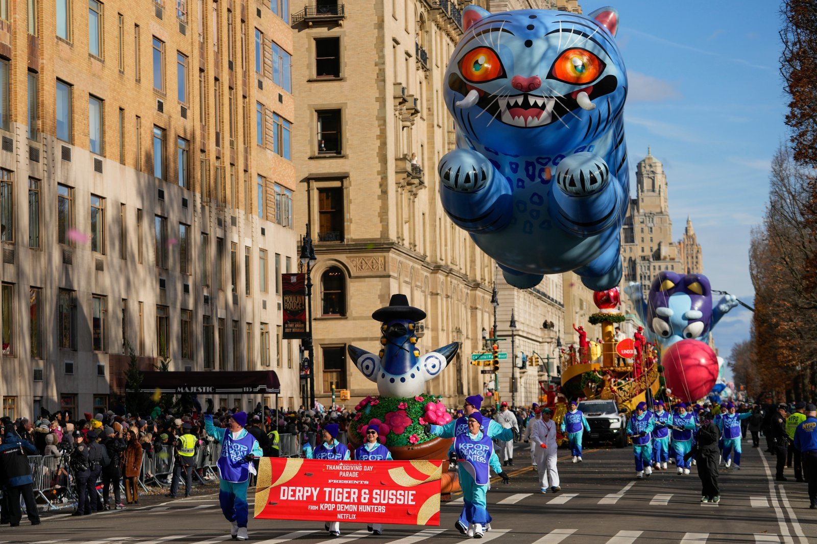 The Derpy Tiger and Suissie balloon floats down Central Park West during the Macy‘s Thanksgiving Day Parade, Thursday, Nov. 27, 2025, in New York. (AP Photo/Frank Franklin)