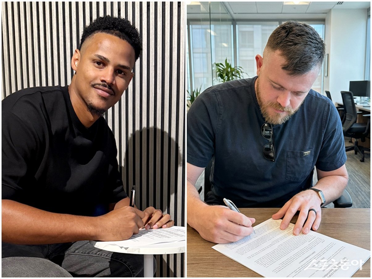 엘빈 로드리게스(왼쪽)와 제레미 비슬리가 롯데와 계약서에 서명하고 있다. 사진제공|롯데 자이언츠