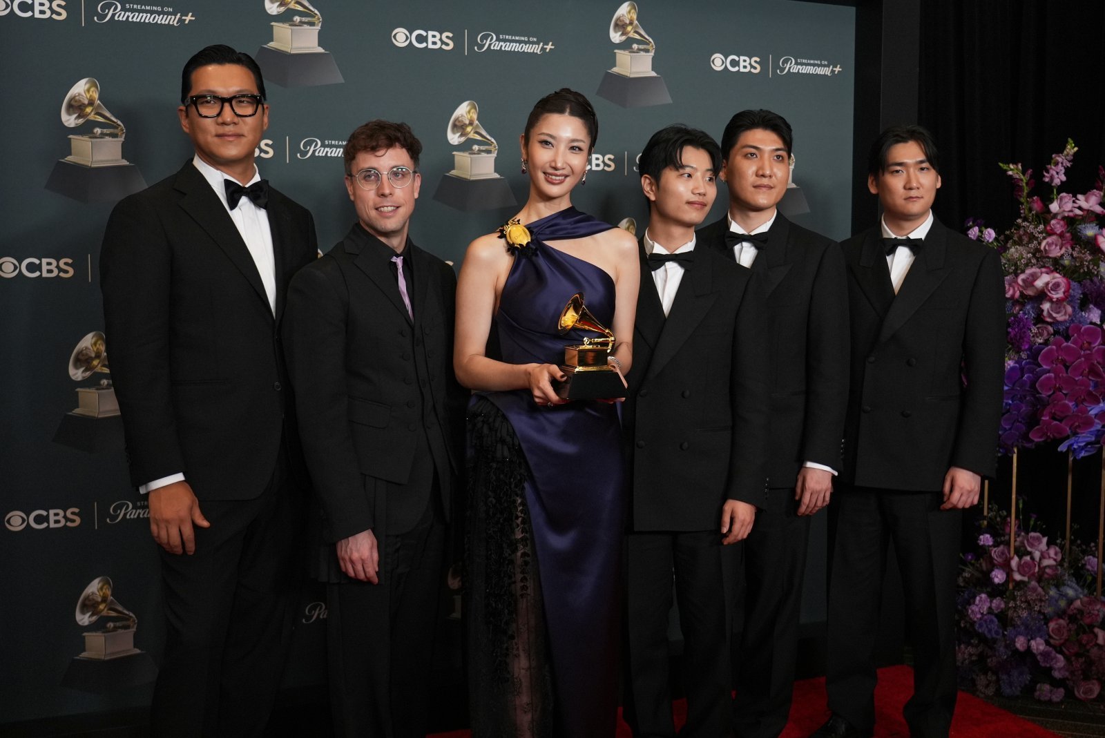 The team from “KPop Demon Hunters” pose in the press room with the award for best song written for visual media for “Golden” during the 68th annual Grammy Awards on Sunday, Feb. 1, 2026, in Los Angeles. (Photo by Richard Shotwell/Invision/AP)