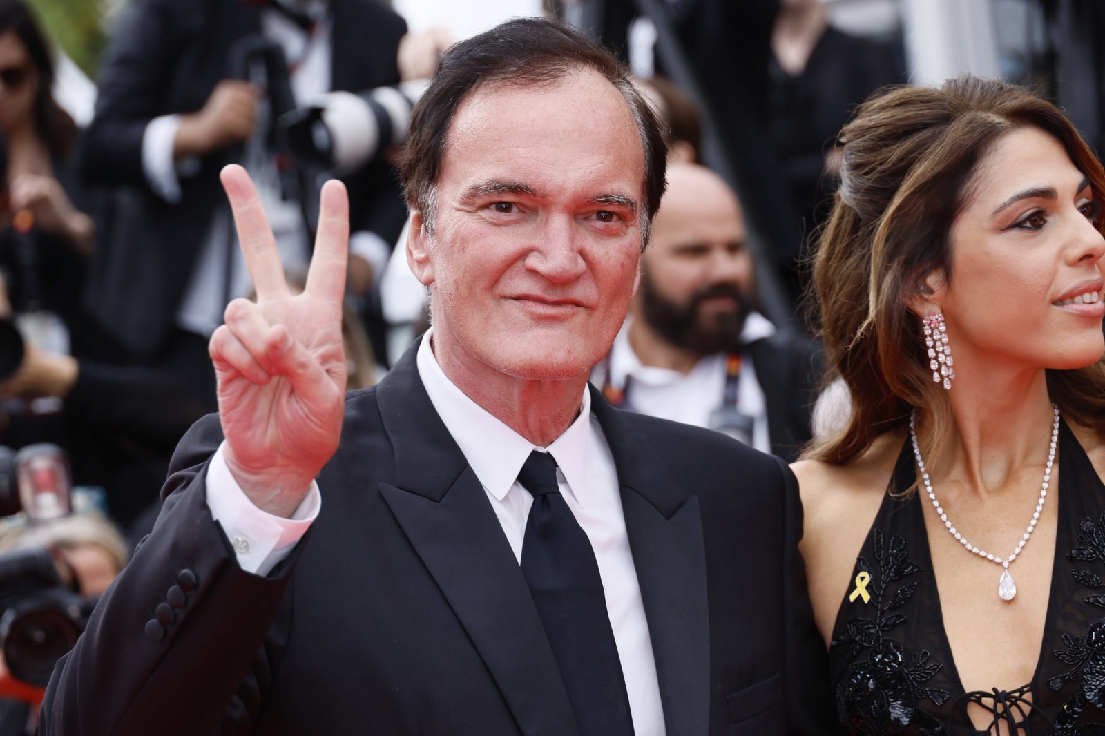 Quentin Tarantino, left, and Daniella Pick pose for photographers upon arrival at the premiere of the film ‘Nouvelle Vague’ at the 78th international film festival, Cannes, southern France, Saturday, May 17, 2025. (Photo by Joel C Ryan/Invision/AP)