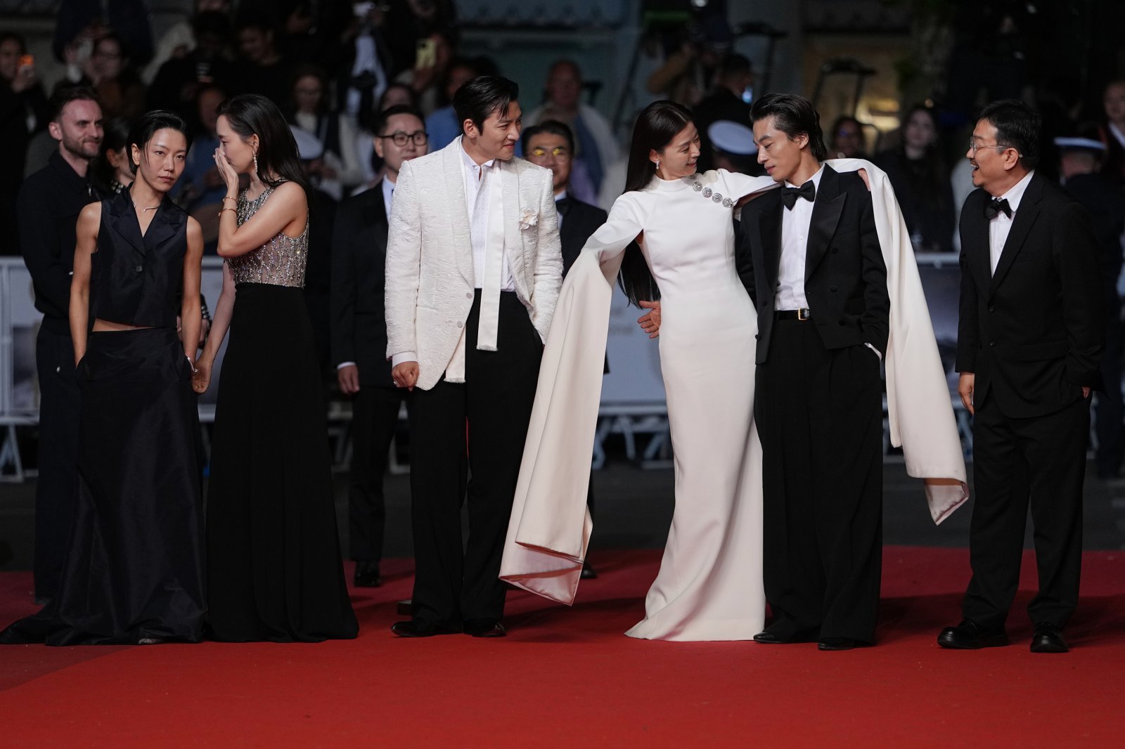 Kim Shin-rok, from left, Shin Hyun-been, Ji Chang-wook, Jun Ji-hyun, Koo Kyo-hwan and director Yeon Sang-ho pose for photographers upon arrival at the premiere of the film ‘Colony’ at the 79th international film festival, Cannes, southern France, Friday, May 15, 2026. (AP Photo/Andreea Alexandru)
