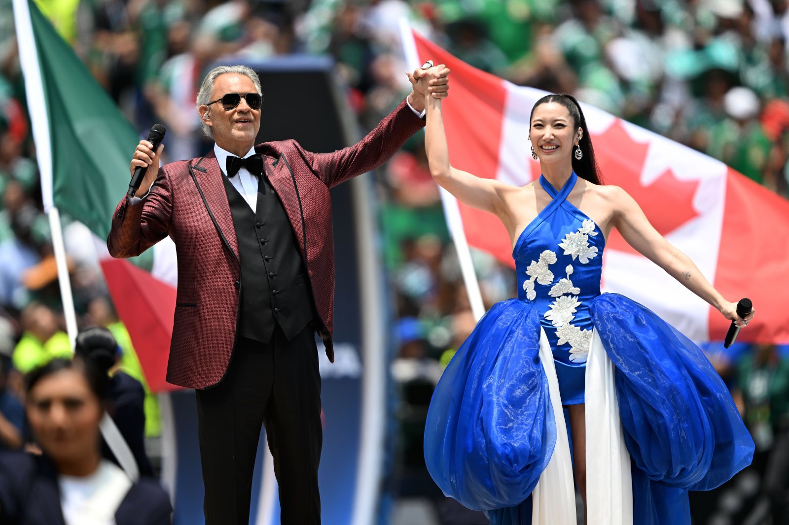 (260612) -- MEXICO CITY, June 12, 2026 (Xinhua) -- Singers Andrea Bocelli (L) and Ejae perform before the group A match between Mexico and South Africa at the 2026 FIFA World Cup at Mexico City Stadium in Mexico City, Mexico, June 11, 2026. (Xinhua/Wu Wei)